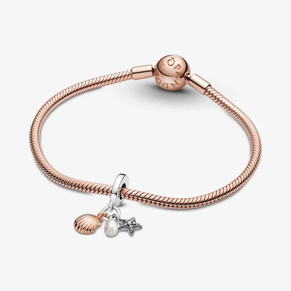 Foto de Charm Penjoll Triple Concha Foto de Charm Penjoll Triple Concha